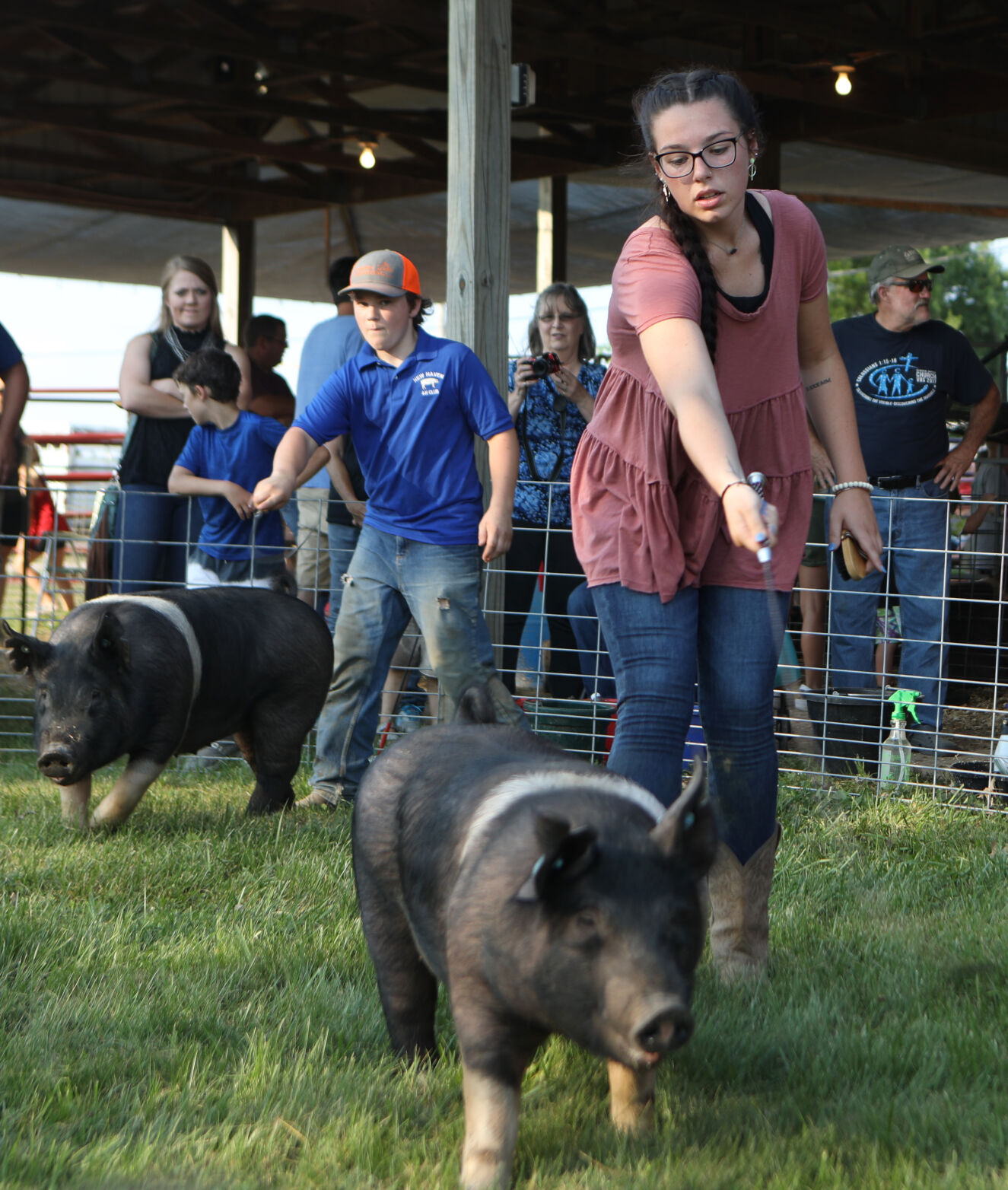 Nicole Brinker and Justin Gerling compete in a livestock show